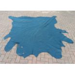 A large leather cowhide, french blue madras, supplied by Yerwood Leather Ltd, Leeds, size 5.37 sq