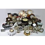 A collection of mantel, carriage and anniversary clocks, to include an oak cased 8 day Elliott