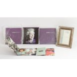 A silver photograph frame, with ribbon and reed border, by Carrs, London 2007, 18 x 14cm, unused,