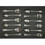 A silver set of twelve fancy pattern tea spoons, Sheffield 1901, initialed B, 158gm.
