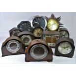 A collection of mid 20th Century & later mantel clocks, manual wind and quartz movements. (4)