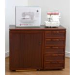 A Horn sewing cabinet, fitted interior, work surface, doubled by unfolding hinged top, W100cm,