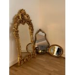 A substantial 'Morris' Louis XV Rococo style wall mirror, gold painted finish, 145x67cm, together