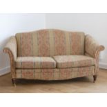 A two seater sofa/chaise, having hinged 'drop arm' to one end, upholstered in a 'Culo Fearnon Poppy'