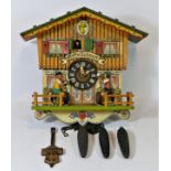 A Hofbrauhaus West German mechanical chalet cuckoo clock, c1970s by E. Schmeckenbecher, beer