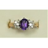 A 9ct gold amethyst and diamond dress ring, K, 2.5gm