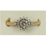 A 9ct gold and diamond cluster ring, stated weight 0.10cts, P, 1.7gm, box