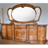 An Italian burr walnut and satinwood mirror backed sideboard, serpentine frontage accented with
