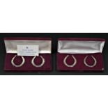 Four cast silver Lucky Horseshoe napkin rings, by FH, London 1980, 101gms, two cases