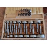 A hole cutting kit, 1/4" to 2 1/8", case and other cutting attachments