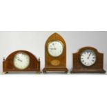 Three early 20th Century inlaid mahogany cased mantel clocks, having Swiss & French 8 day movements.