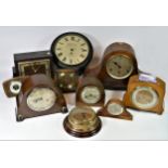 A collection of manual wind and quartz movement mantel clocks, to include a Smiths brass lantern