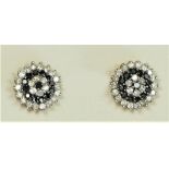 A pair of 9ct gold black and white diamond cluster ear studs, 1.8gm