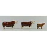 A Beswick Hereford bull, champion of champions, c1950s, model number 1363A, height 11cm, to gether