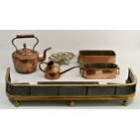 An Edwardian copper kettle, together with a brass trivet, two copper plant troughs, a copper