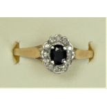 A 9ct gold sapphire and diamond cluster ring, O, 1.4gm