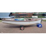 An Enterprise sailing dinghy, serial number 310, mould 10, sail number K16581, 4 meter/two person,