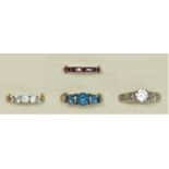 Four various silver gemset rings, various sizes