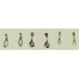 Three pairs of 9ct gold ear rings, ruby, diamond and pearl, amethyst and a pale blue stone