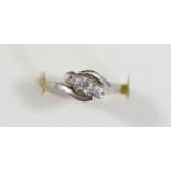 An 18ct gold and diamond illusion set ring, H, 2gm