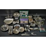 A large quantity of plated wares to include a Royal Venton Ware, Old Country Inns, biscuit barrel