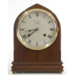 A Franz Hermle mantel clock, mahogany case, German 8 day movement striking to bell, standing on four