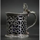 A Victorian cast silver mustard pot, London 1896, with blue glass liner, 77gms of weighable silver