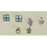 A pair of 9ct gold tanzanite lozenge shape ear studs, a pair of blue topaz ear studs and a pair of