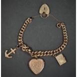 A 9ct rose gold charm bracelet, mounted with a back and front heart locket, an anchor and