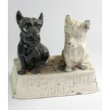 A Buchanan's Black & White Whisky Scottie dogs back bar advertising figure, painted spelter, 27cm