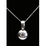 A 9ct white gold and brilliant cut diamond solitaire pendant, stated weight 0.15ct, chain, 1.3gm