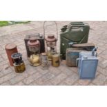 A War Department 5 gallon Jerry can, dated 1988, two Tilley lamps, a paraffin cooker in can and