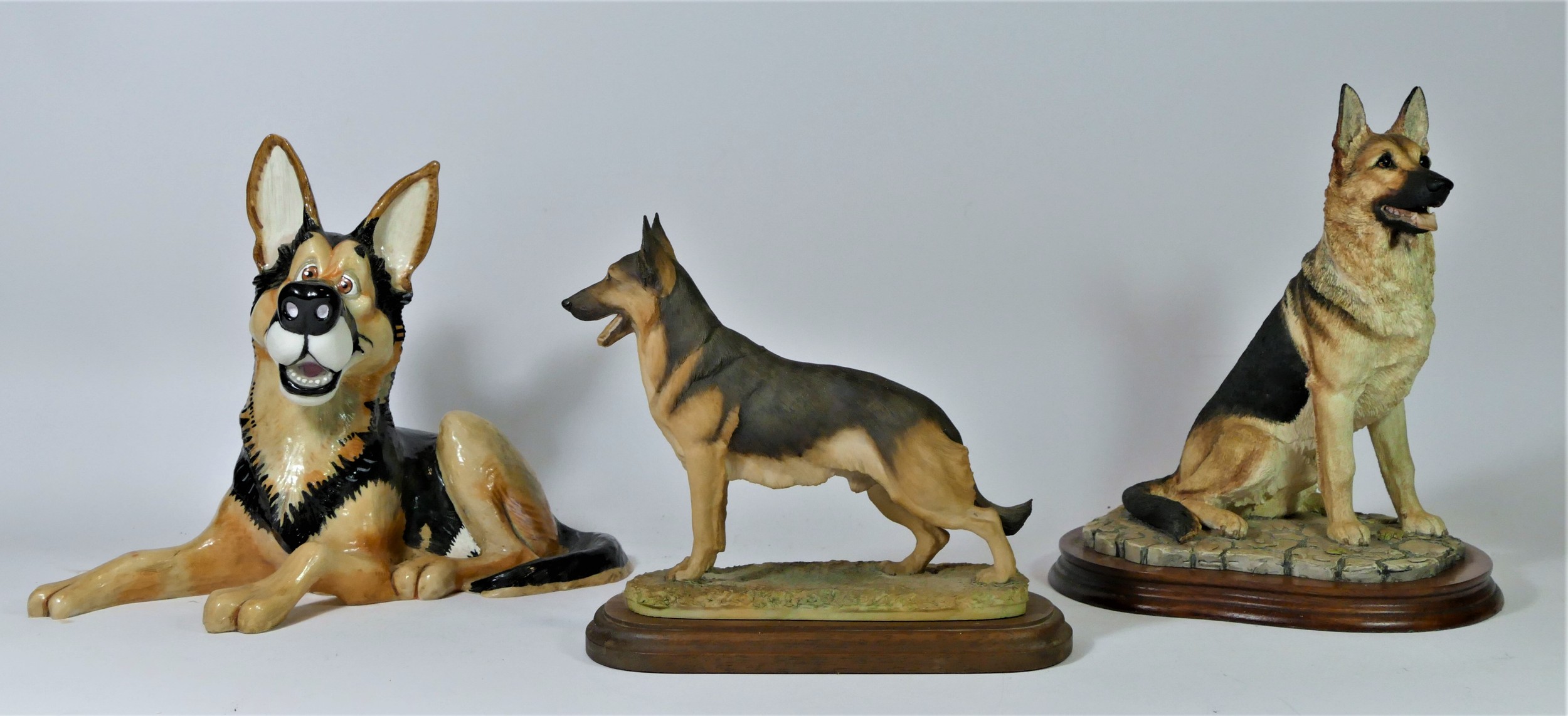 A large Border Fine Arts model of a german shepherd dog, stamped to base 'BFA Scotland 1994. M.