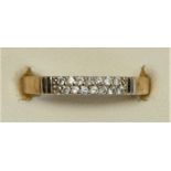 A 9ct gold and two row brilliant cut diamond half eternity ring, H (mis-shaped), 1.5gm