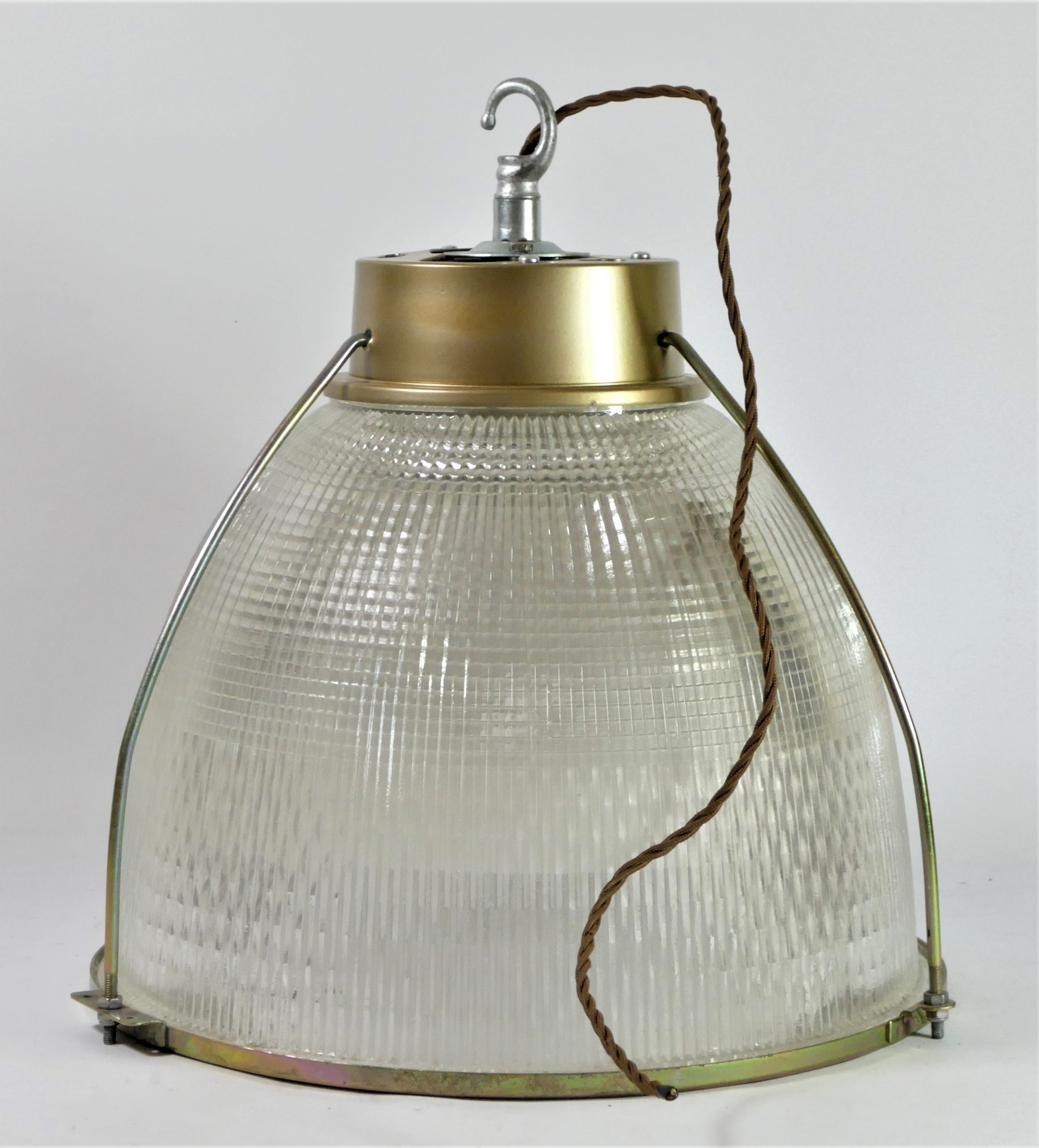 A 1970s Metpro hanging lamp, bauhaus style with lens effect fresnel textured glass shade, having new