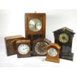 Four boxes of mid 20th Century and later manual wind and Quartz mantel and wall clocks. (4)