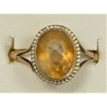 A 9ct gold and citrine single stone ring, K, 2.1gm