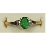 A 9ct gold and green paste single stone ring, L, 1gm