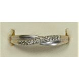 A 9ct white gold and diamond half eternity ring, N 1/2, 1gm