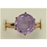 A rose gold single stone amethyst dress ring, tests as 18K, m 1/2, 2.3gm