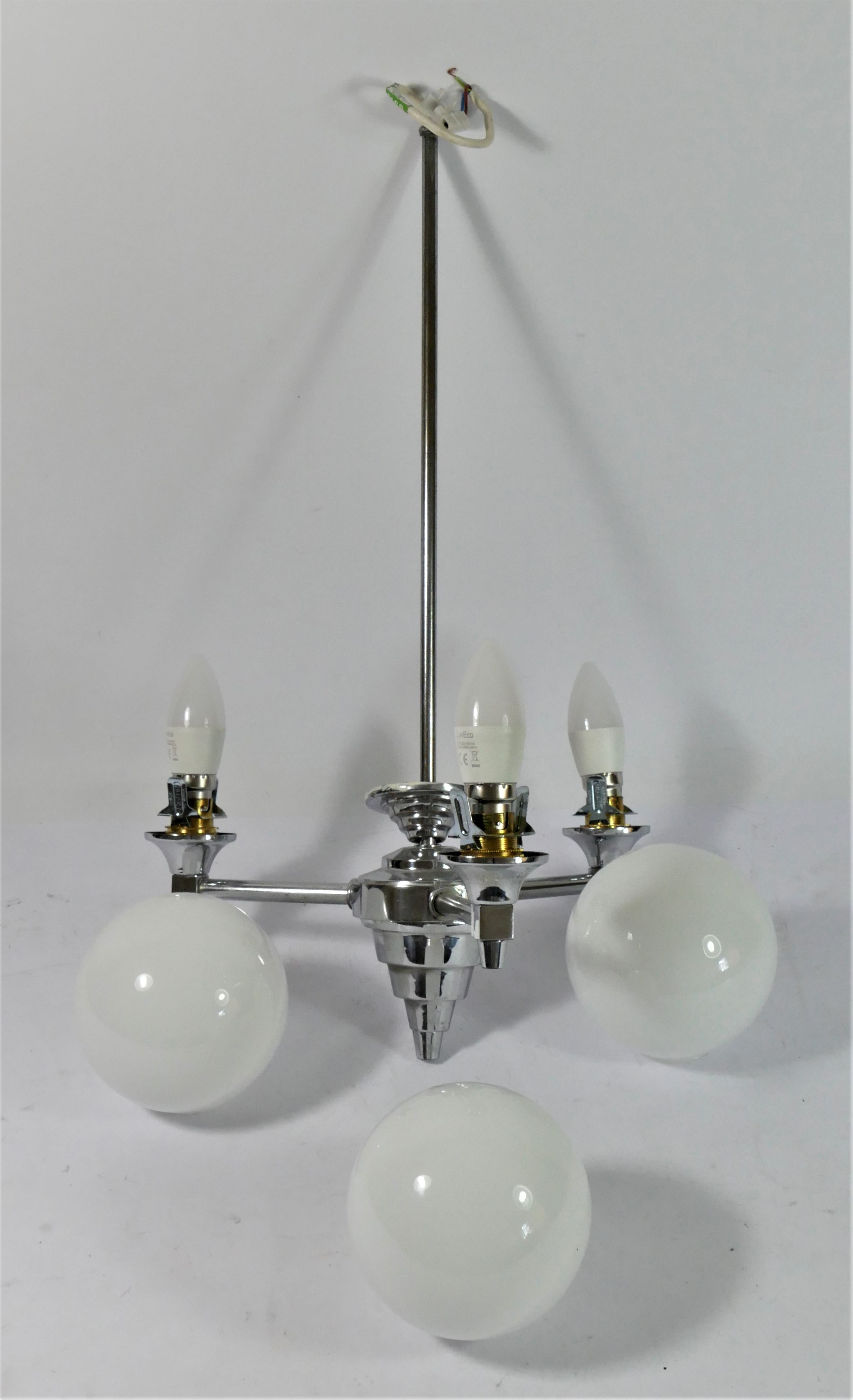 An Art Deco period 3 branch chandelier/ceiling light, chrome with white opaque glass shades.