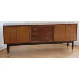 E.Gomme G Plan Librenza sideboard cabinet c1960s, model 4005, in tola wood having three central
