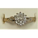 A 9ct gold and diamond cluster ring, stated weight 0.15ct, M 1/2, 1.4gm