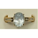 A 9ct gold pale blue and white topaz dress ring, N 1/2, 3.3gm