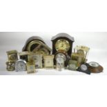 A large collection of mid 20th Century and later mantel clocks and barometers to include 8 day