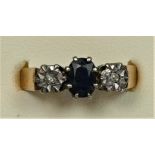 A 9ct gold sapphire and diamond three stone ring, S, 3.5gm