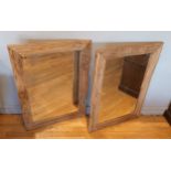 A pair of drift wood framed bevel edged glass wall mirrors, of rectangular form. (2) 107x78cm.