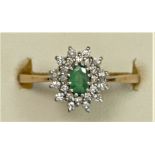 A 9ct gold, emerald and diamond cluster ring, O, 2.1gm