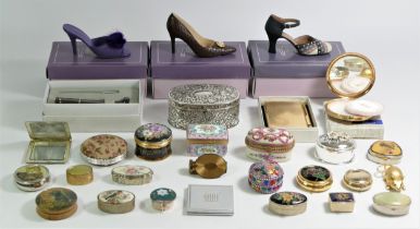 A collection of accessories, enamel, china, onyx and metal pill boxes, a Stratton gold coloured