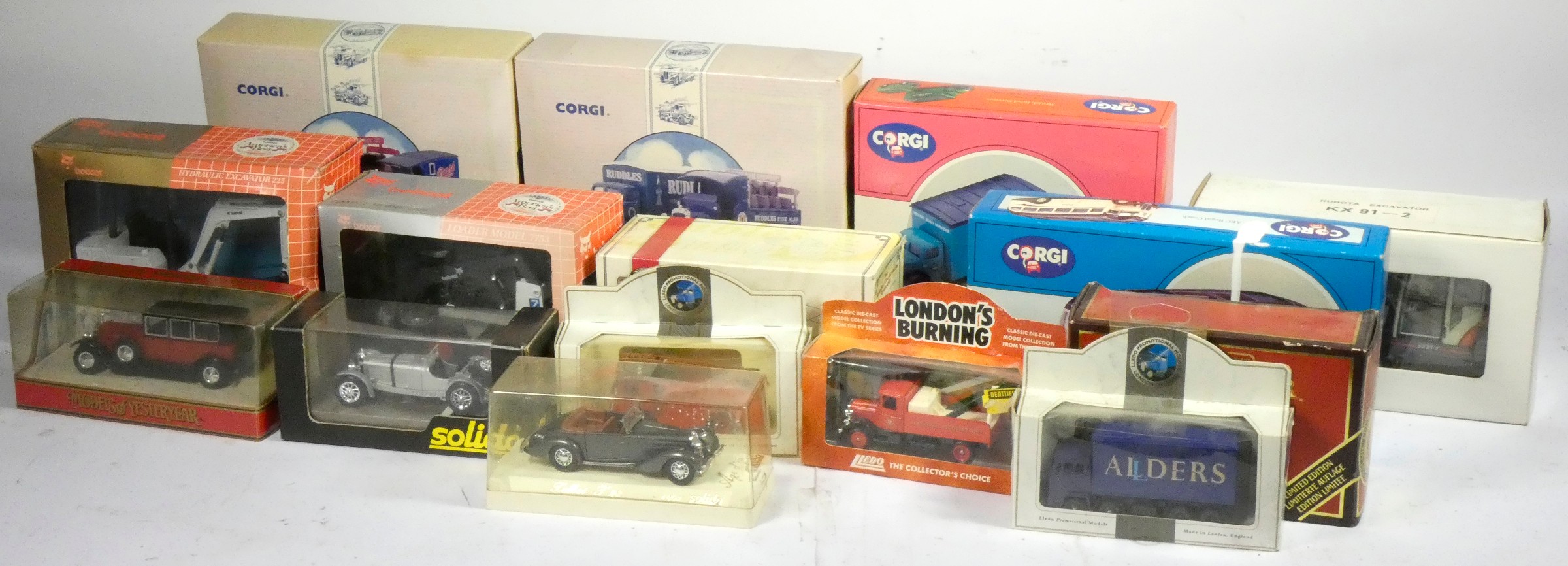 A collection of 36 die-cast vehicles, including brands such as Corgi, Maisto, Days Gone, Bobcat, - Image 3 of 5